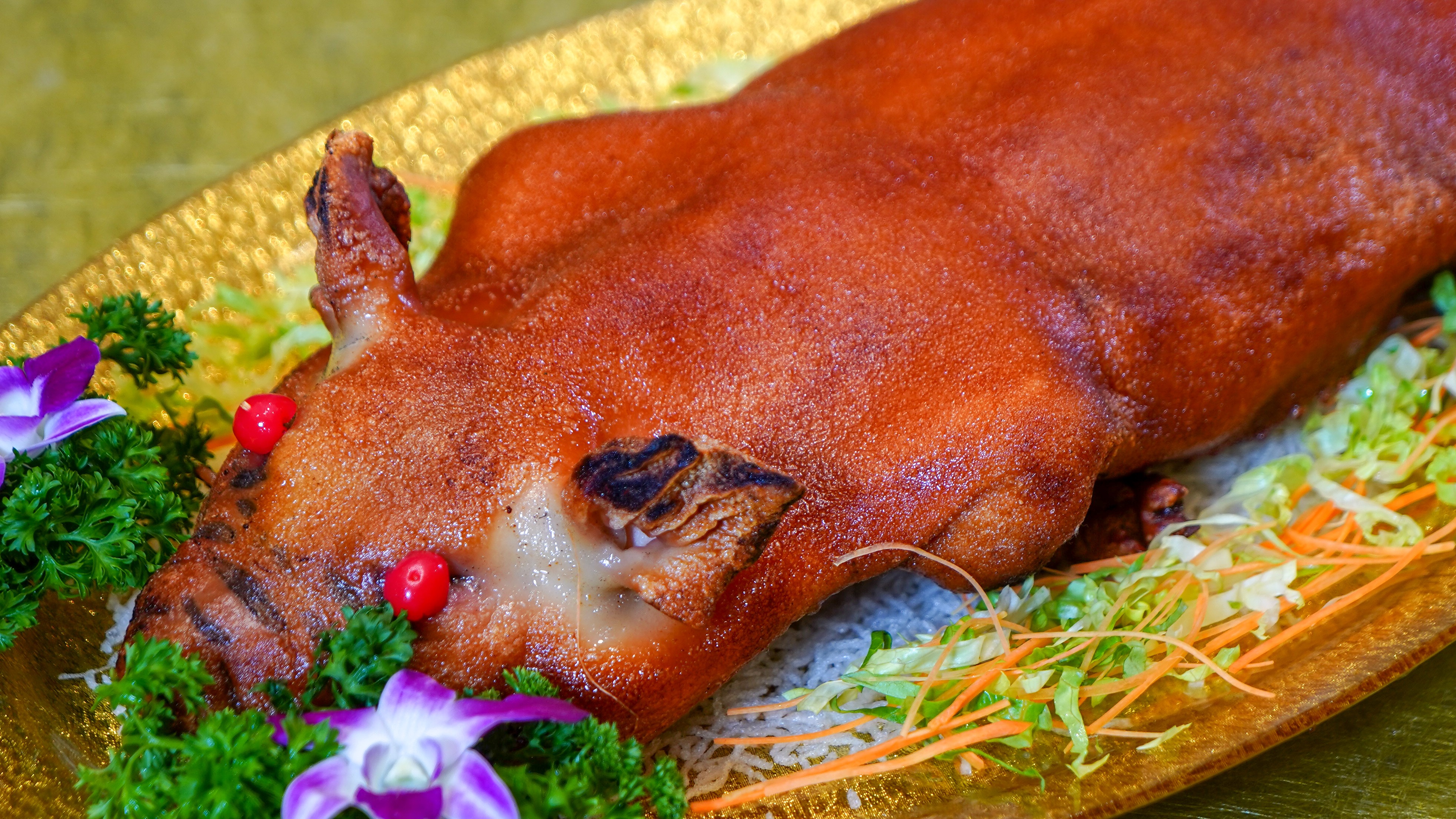 宫廷名菜到百姓餐桌——丽景酒楼鸿运手抓猪